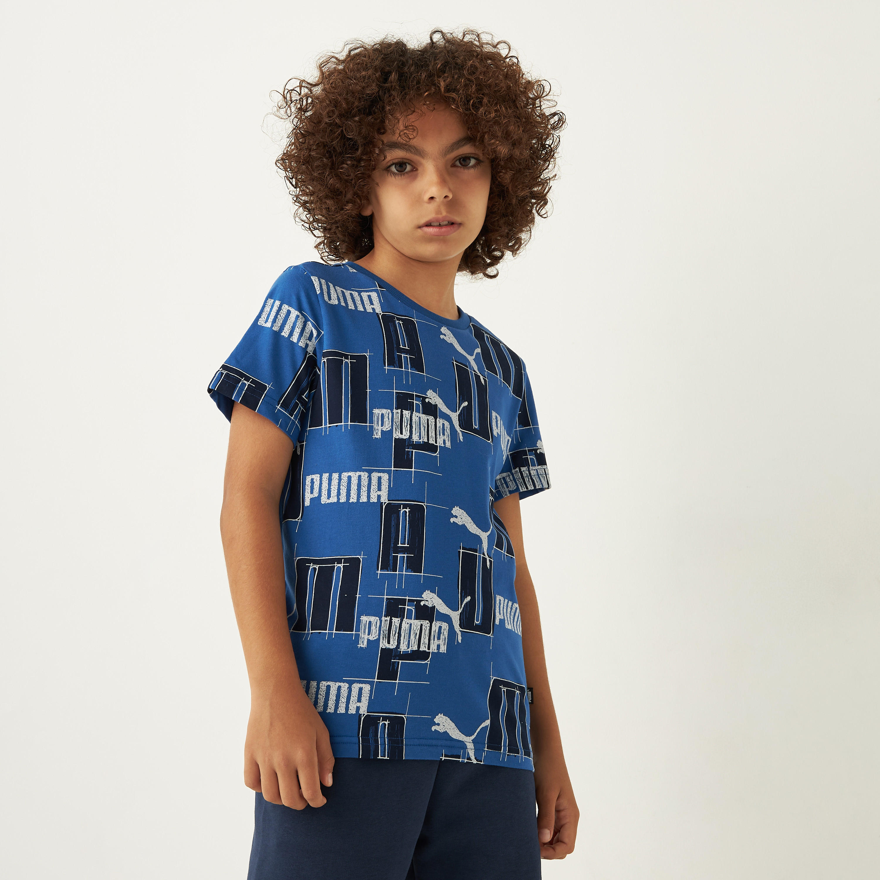 Shop PUMA All-Over Logo Print T-shirt with Short Sleeves Online |  Centrepoint Kuwait